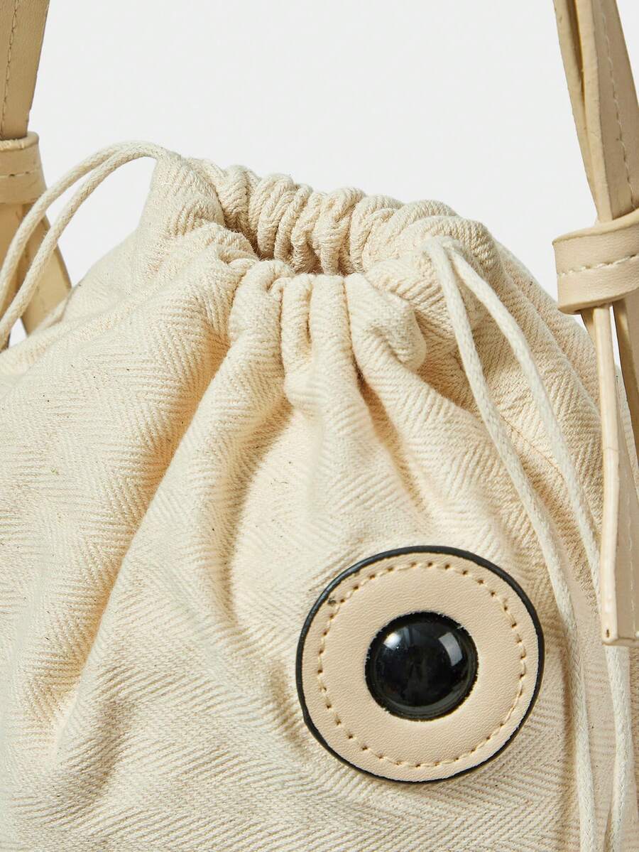 Side view of fish shape beach bag with flared tail and pastel iridescent sequins