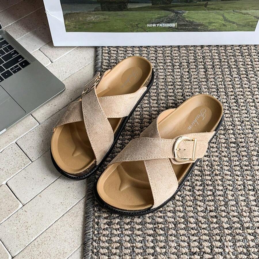 4 media show dusty pink and beige suede-look crisscross slide sandals with gold side buckle, tan molded footbed, stitched welt look, black chunky outsole. image 2