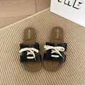 7 media show lace-up flat slide sandals in cream, black, metallic silver and cream black polka dots with H-cut wide vamp strap, sneaker-lace detail, open toe, backless slip-on, brown padded METWO footbed and thin black outsole. image 3