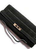 Black square clutch bag with diagonal strap band and gold clasp