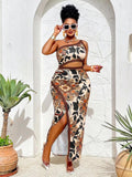 One-shoulder tropical print top with high-waist slit midi skirt