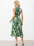 Back view of pleated green tie-dye midi dress showing halter keyhole closure and defined waist