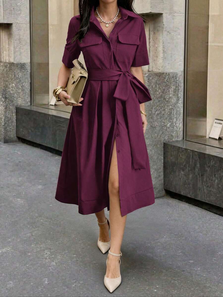 Burgundy A-line midi dress styled with handbag and heels
