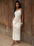 Front view of ivory fitted palm print one-shoulder maxi dress