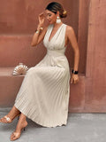 Full view of apricot sleeveless wrap-neck pleated A-line midi dress