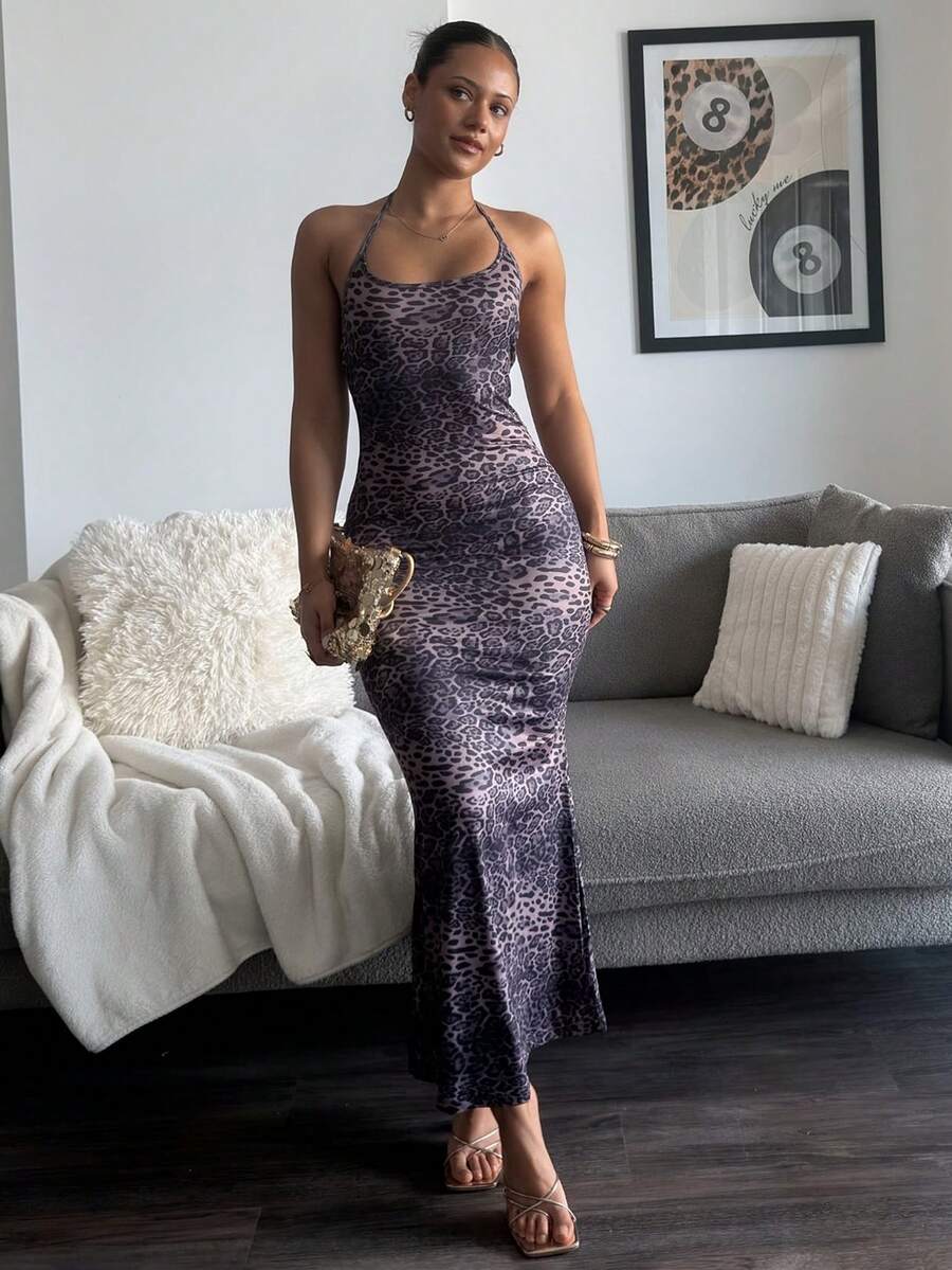 Front full body view of purple leopard print halter bodycon maxi dress