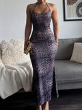 Close up front view of purple leopard halter dress with scoop neckline and fitted waist