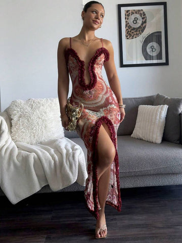 Front view of floral paisley ruffle maxi dress with plunging neckline and high thigh slit