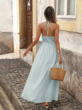 Back view of aqua blue boho halter maxi dress with open back and halter tie