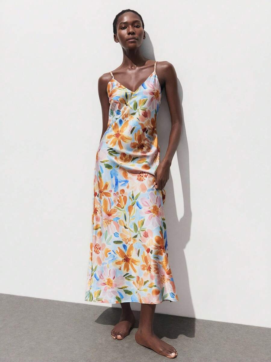 Elegant Off-White Floral Print Sleeveless Dress for Autumn Vacations and Holiday Events