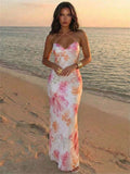 Pale yellow floral halter maxi dress side view