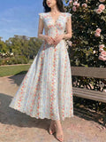 Styled view of cream floral striped V neck lace trim midi dress showing visible color, trim, and silhouette