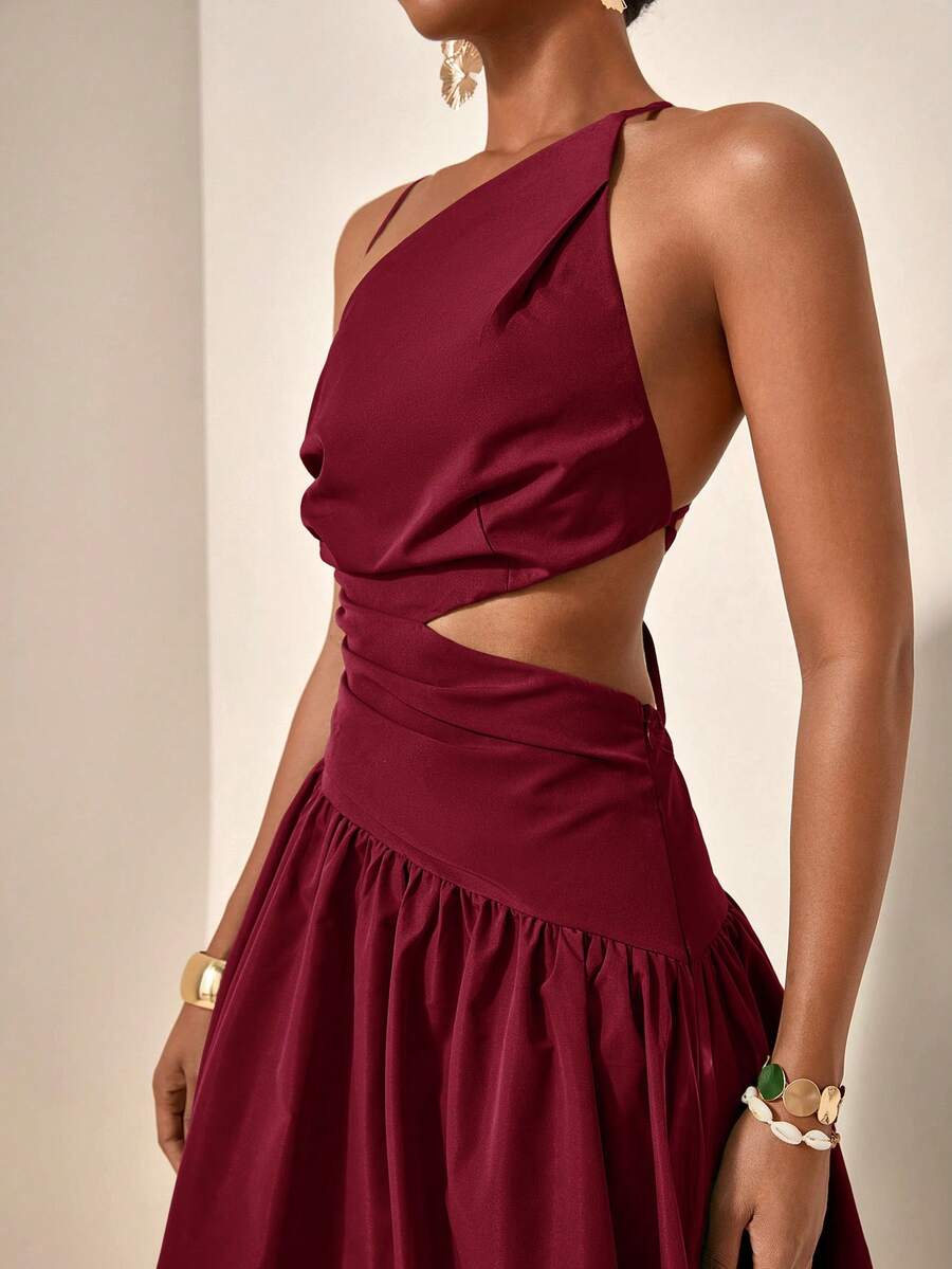 Close-up burgundy one-shoulder maxi dress with waist cutout