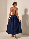 Back view navy maxi dress with crisscross tie straps and open back