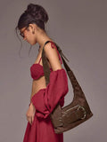 Brown crescent hobo bag with adjustable strap and front zipper pocket