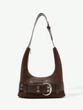 Detail view of brown hobo bag showing belt band buckle and eyelets