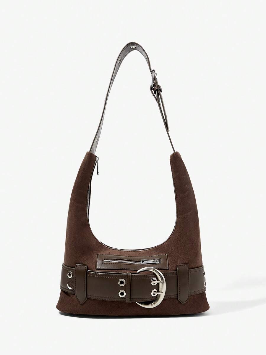 Detail view of brown hobo bag showing belt band buckle and eyelets