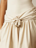 Full view of apricot rosette ruffle mini dress with smooth stretch knit finish