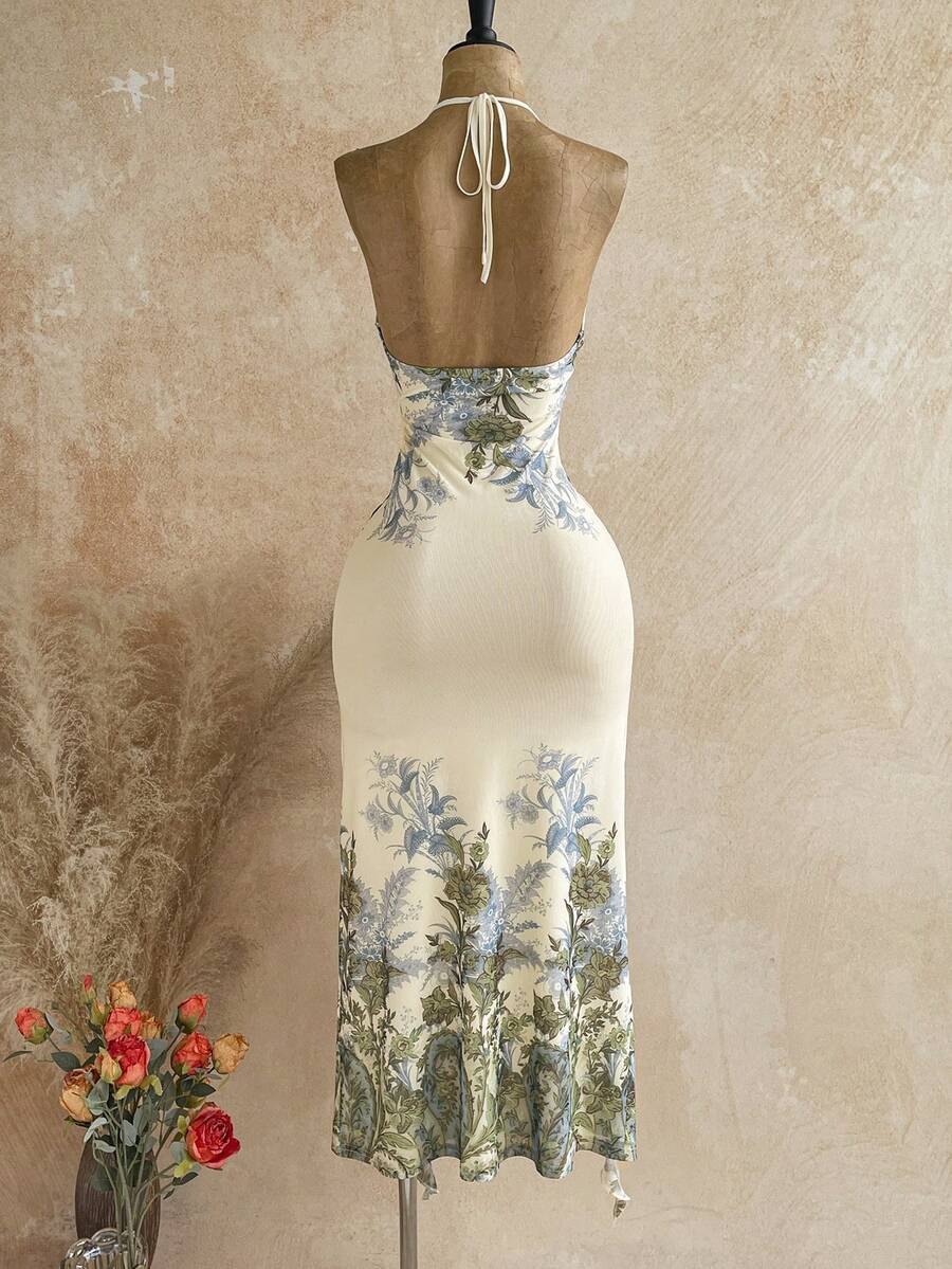 Cream blue floral halter maxi dress, side waist cutout with ring, front ruffle slit, straw bag styling