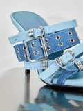 Baby-blue woven vamp close-up of pointed-toe buckle mule sandals with woven fabric upper, open toe, and high stiletto heel