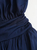 Navy blue halter vacation dress with flounced mini silhouette