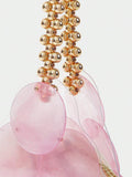 Close view of pink shell paillettes and satin drawstring top