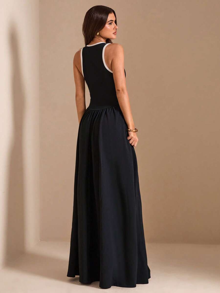 Black sleeveless maxi dress with white trim and full skirt
