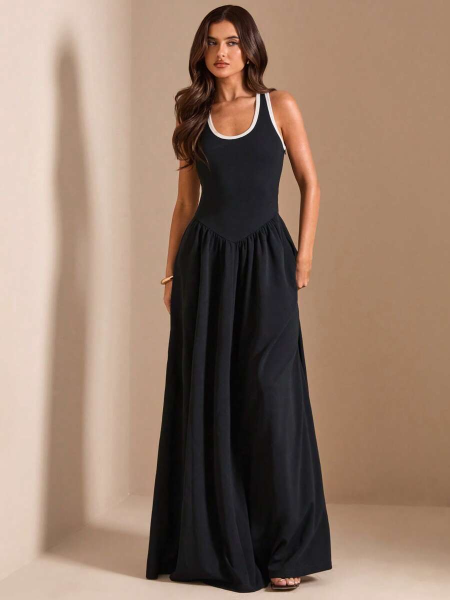Black sleeveless maxi dress with white trim and full skirt