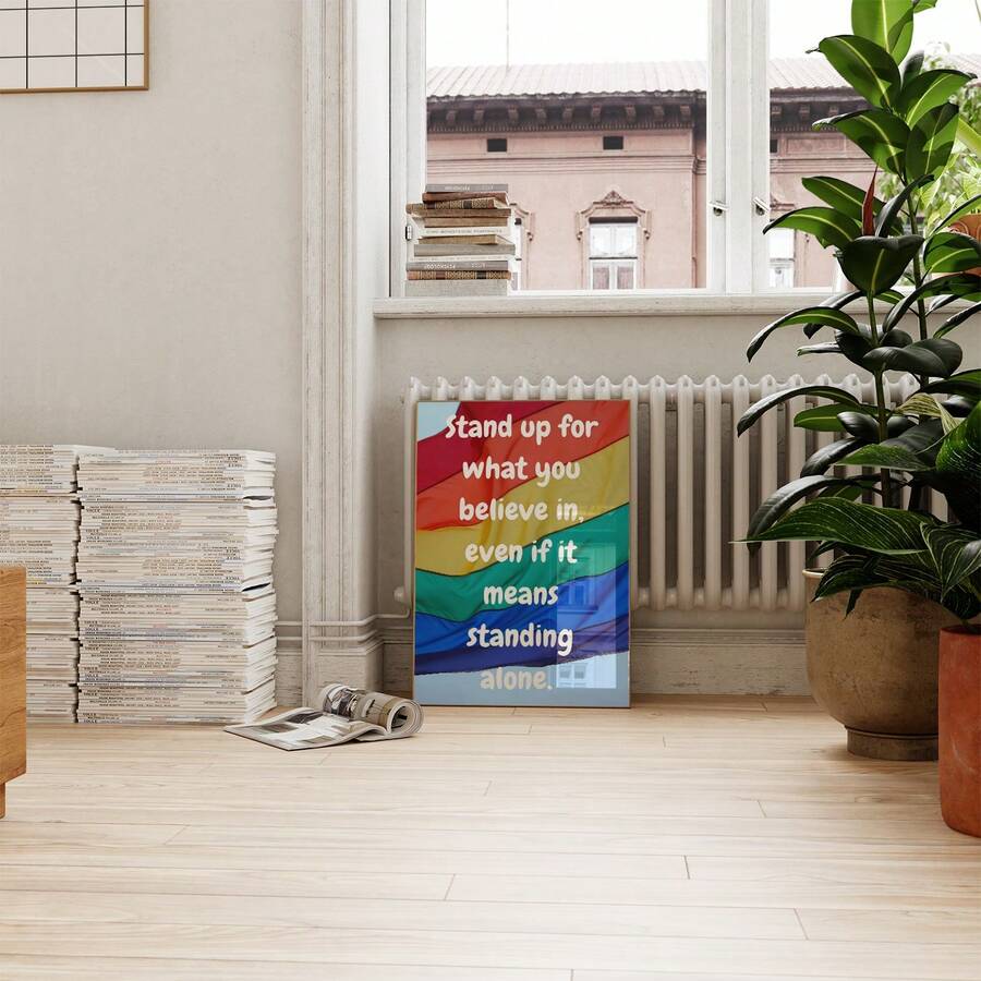 Framed pride quote poster on plain wall
