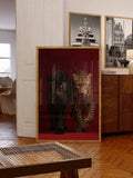 Framed red big cat wildlife print styled in living room near cabinet