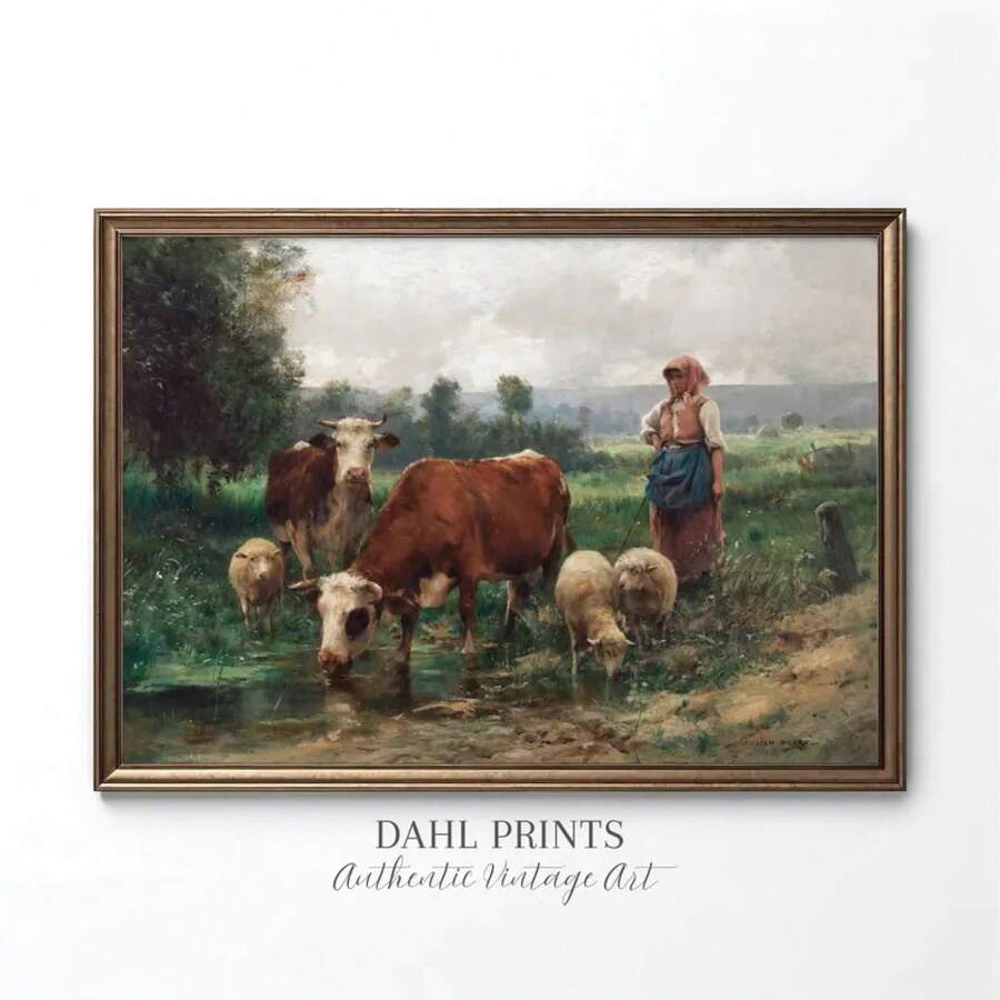 Vintage cow and sheep wall art with pastoral landscape scene