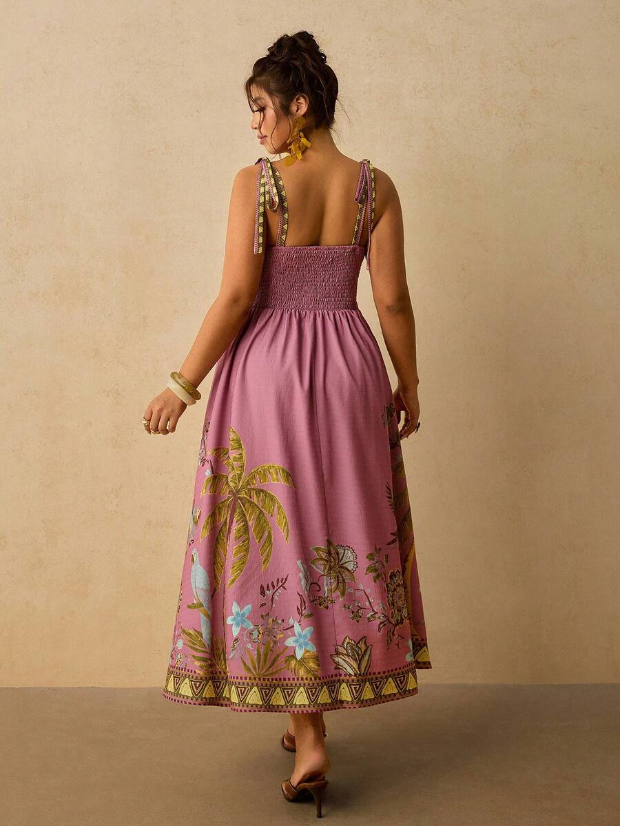Back view of dusty pink cami dress with shoulder bows and smocked bodice