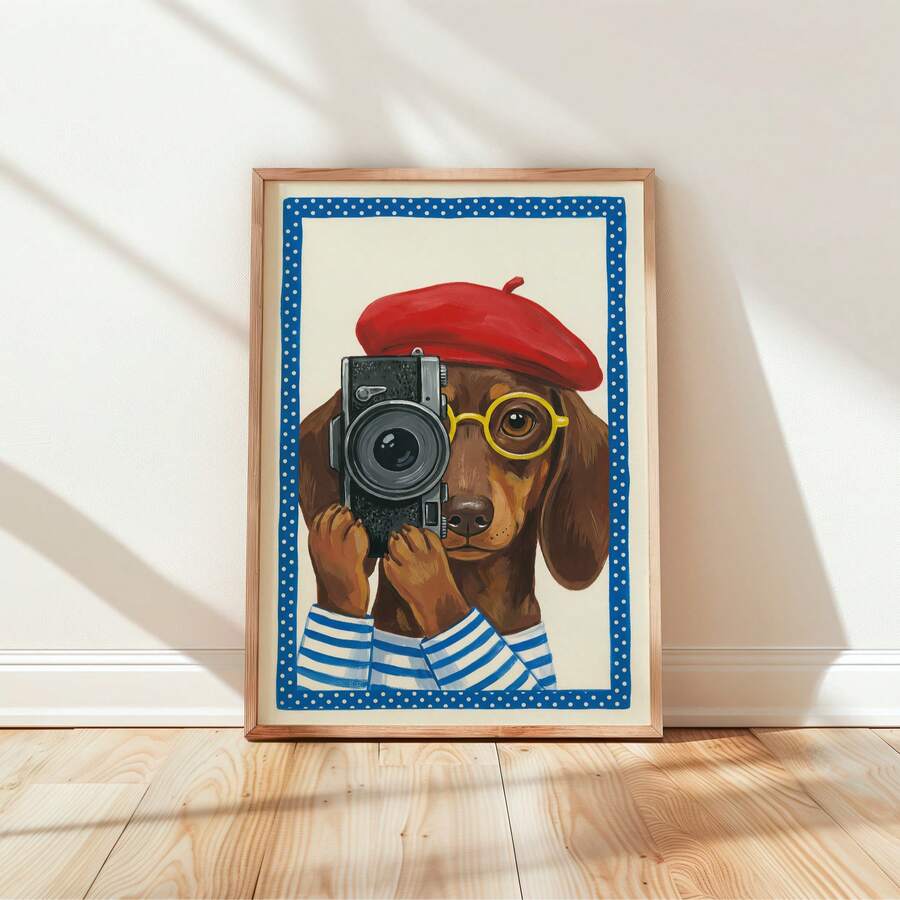 Framed dachshund photographer wall art leaning against pink wall