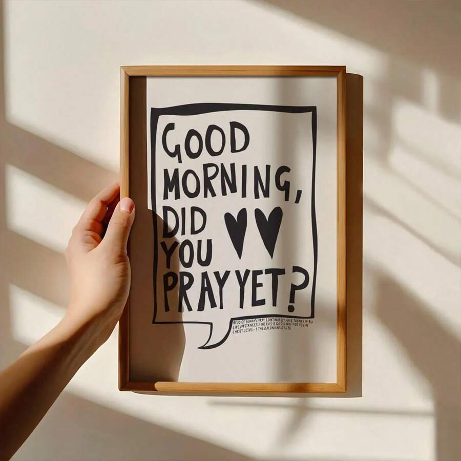 Hand-held light wood framed black-and-white prayer wall art poster with Good Morning Did You Pray Yet message