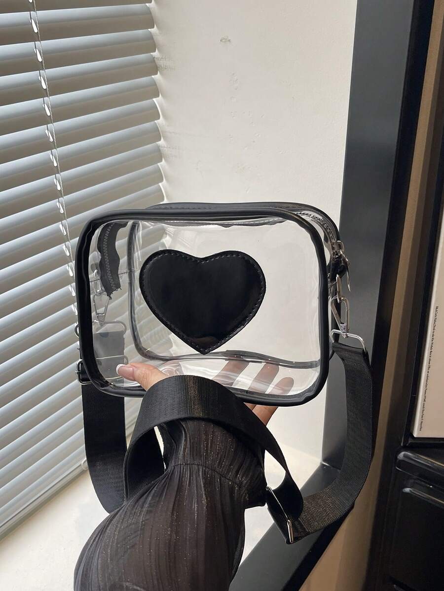 Transparent heart shoulder bag with silver hardware black trim and rounded rectangular box shape
