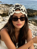 Black openwork crochet beanie hat with sparkle sequin details