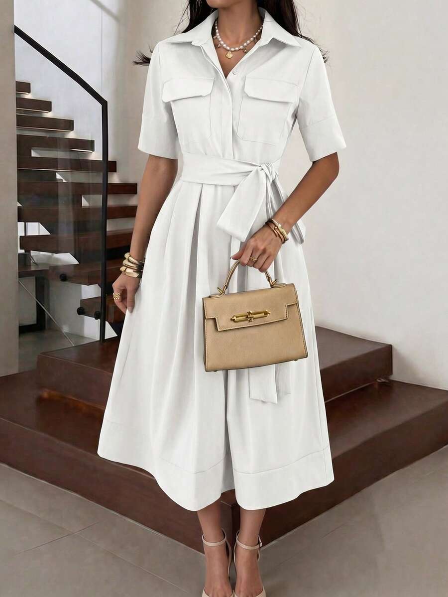 Front view of white collared belted button front midi dress