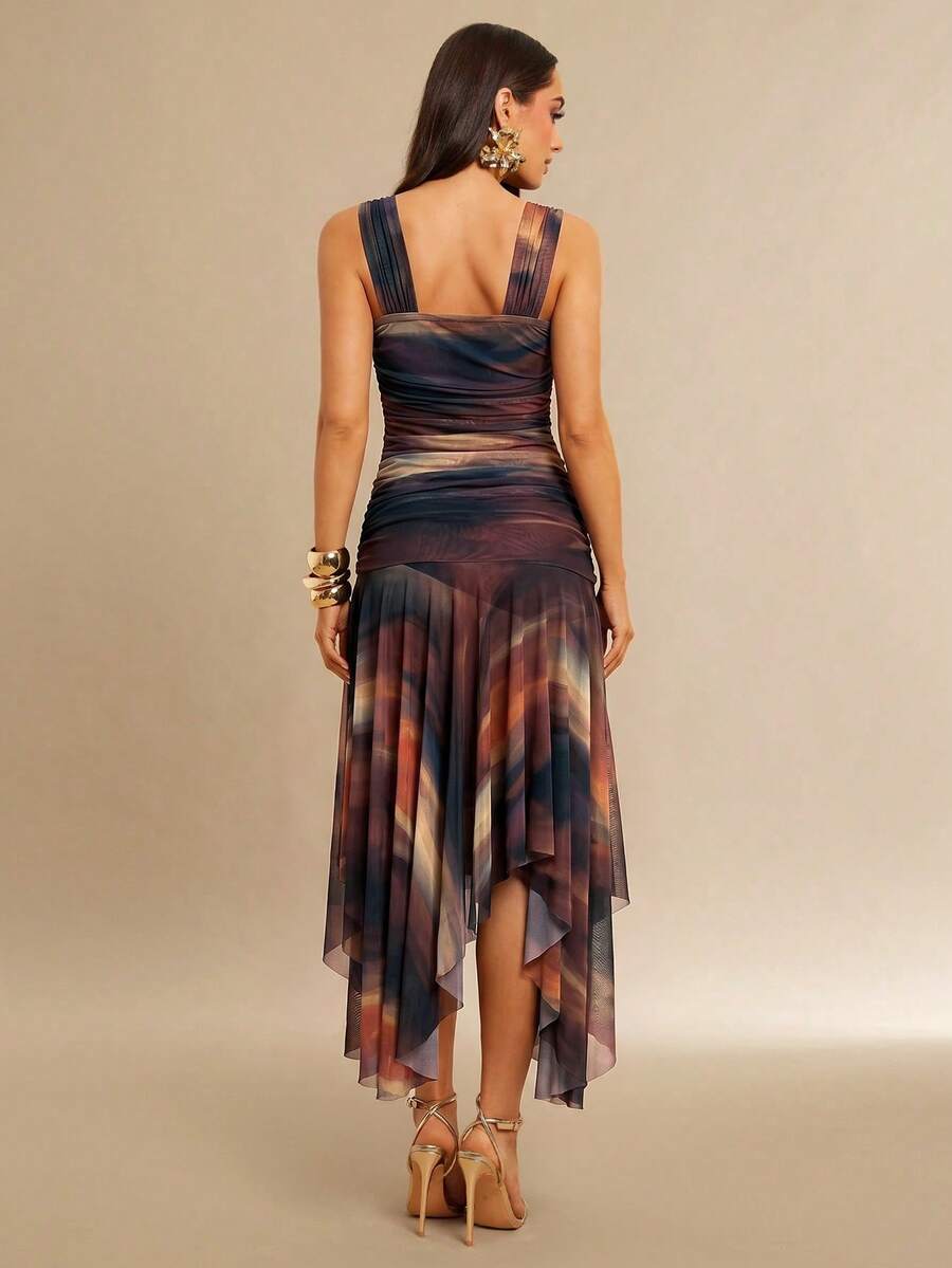 Front view of multicolor abstract mesh midi dress with ruched bodice and handkerchief hem