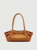 Straight front view of tan suede shoulder tote bag with wide body and long handles