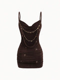 Brown bodycon mini dress with spaghetti straps and fitted ruched design