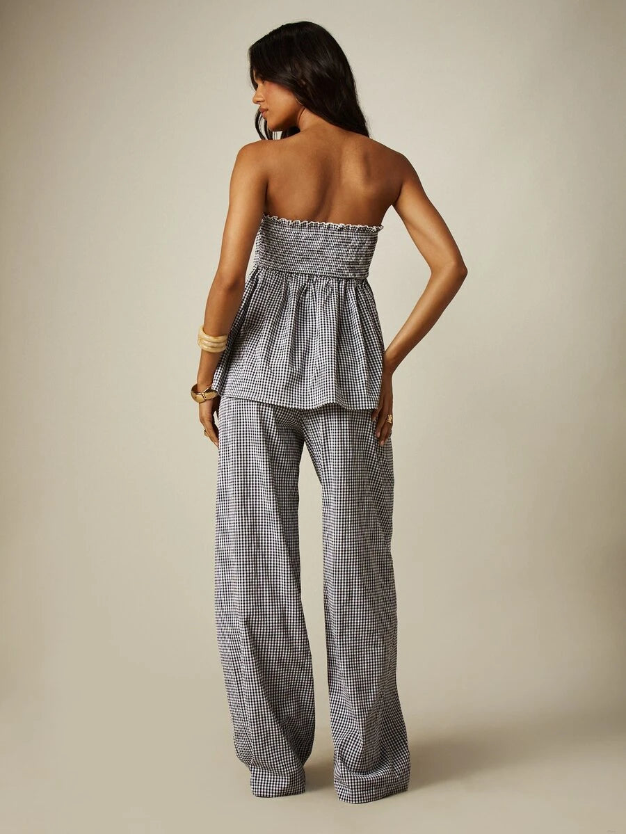 Front view of black white gingham two piece set with strapless smocked bandeau top and wide leg pants