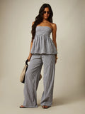 Full view of black white checked summer co-ord set with smocked top and matching pants