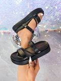 Multi strap platform sandals detail view showing adjustable buckle and padded rounded footbed