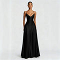 Full-length front view of a glossy black spaghetti-strap formal dress