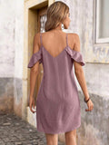 Back view of purple cold shoulder mini dress with V-shaped back