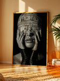 Grayscale money artwork displayed above a console table
