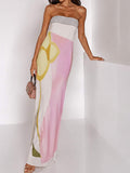 Rear view of white strapless maxi dress with striped neckline band and full-length straight skirt