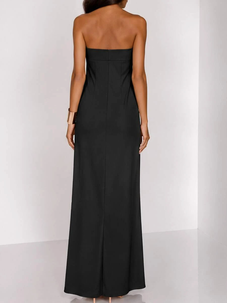 Rear view of plain black strapless maxi dress showing clean fitted bodice and straight hem for vacation wear