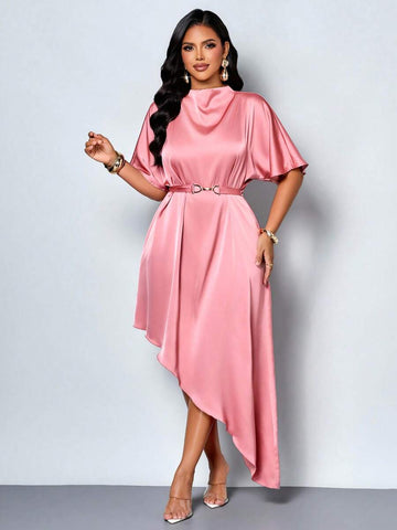Front three-quarter view of dusty rose satin cowl-neck dress with batwing sleeves and asymmetric hem