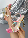 Worn view of pastel strappy high heel sandal with tie-dye straps and sculptural gold heel